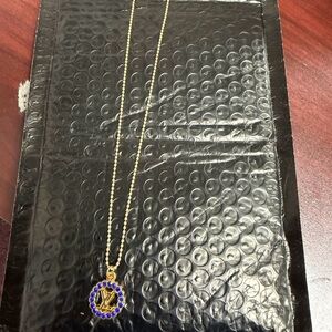 Elegant Gold tone and purple Pendant Necklace. Perfect for Valentine’s Day.
